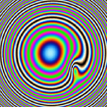 \includegraphics[width=0.4\textwidth]{newton-ring-col-1}